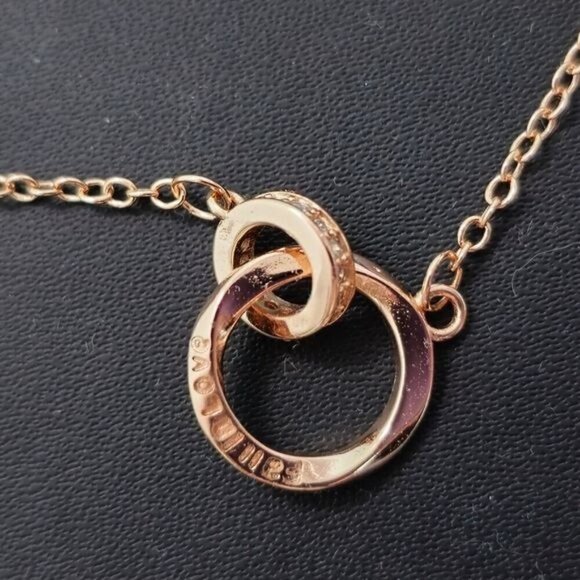 Interlocking Mobius Engraved Necklace‎ in Rose Gold (NWOT) - Picture 3 of 5